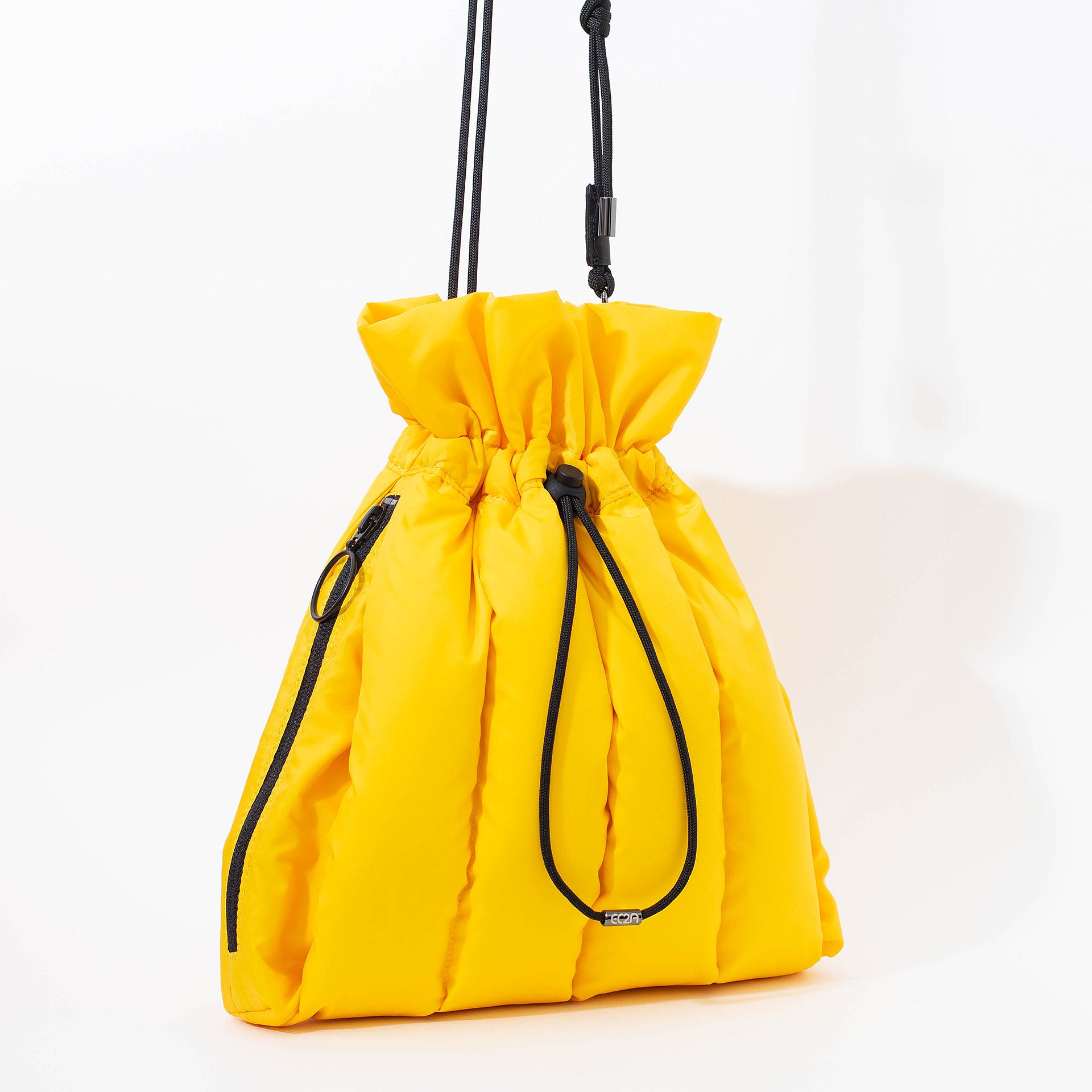 EC2A yellow duck down puffer drawstring handbag, quarter side view